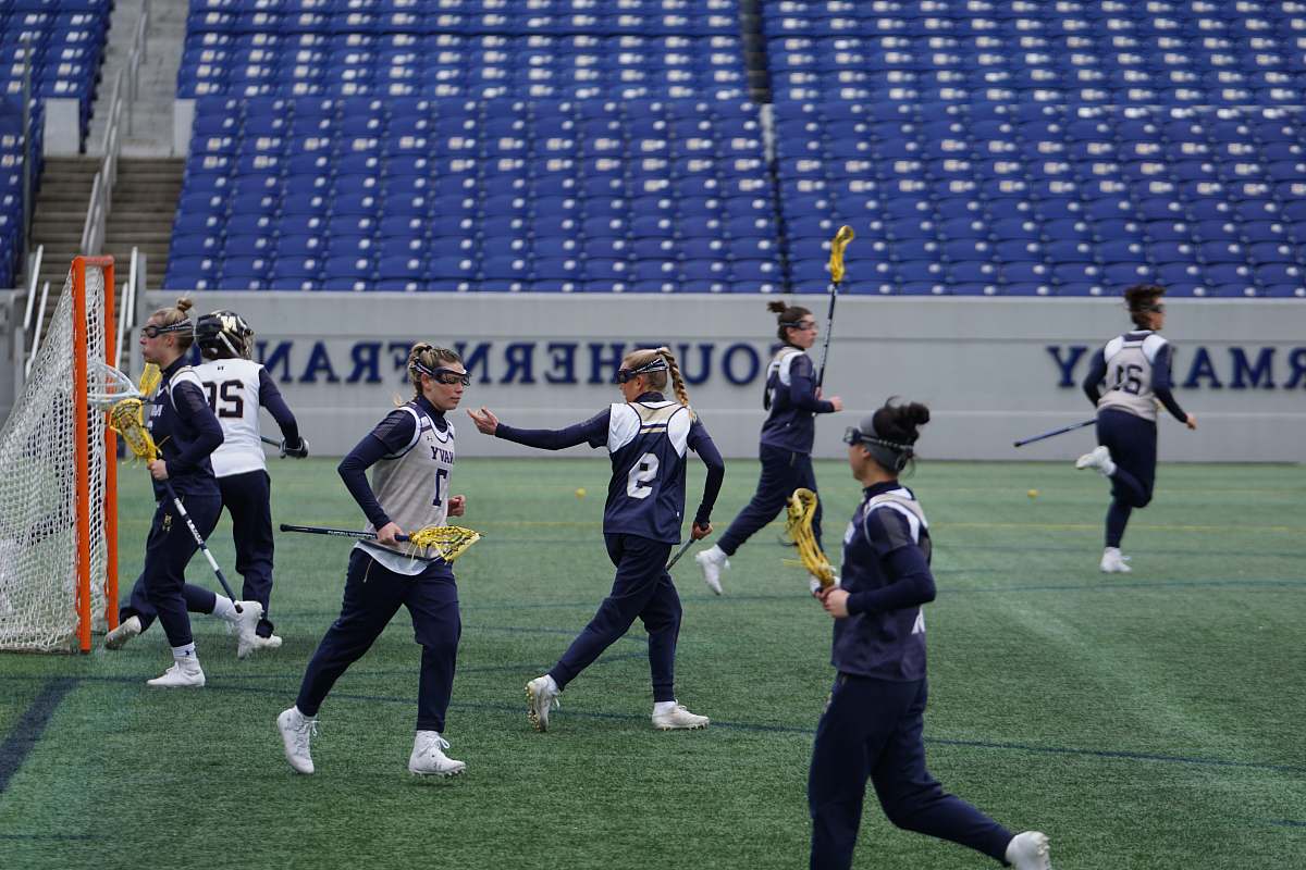american football women playing lacrosse human